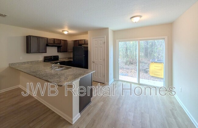 Foto del edificio - 7876 Playschool Ln