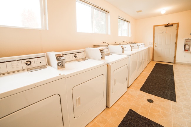 on-site laundry room - Quail Hollow Apartments