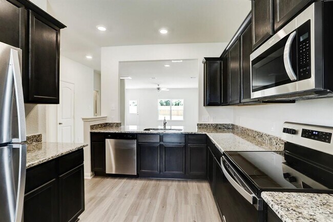 Foto del edificio - 10702 Spring Brook Pass Dr