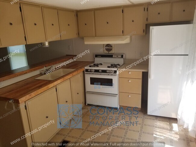 Building Photo - $1195 Singlewide with deck and yard