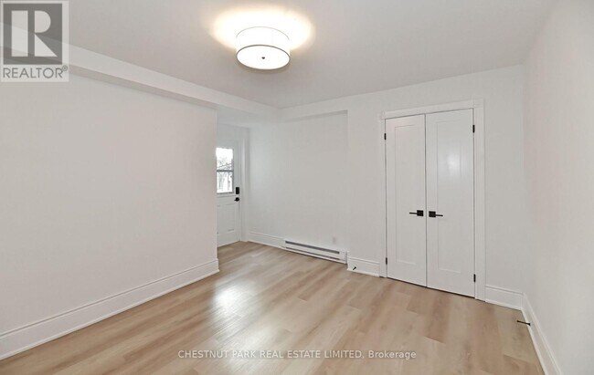 Building Photo - 1105 Queen St E