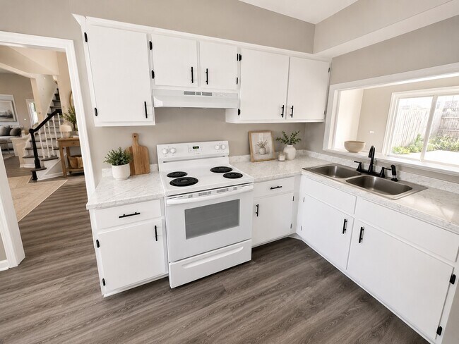 Cocina (reformada) - Carriage Hill Townhomes