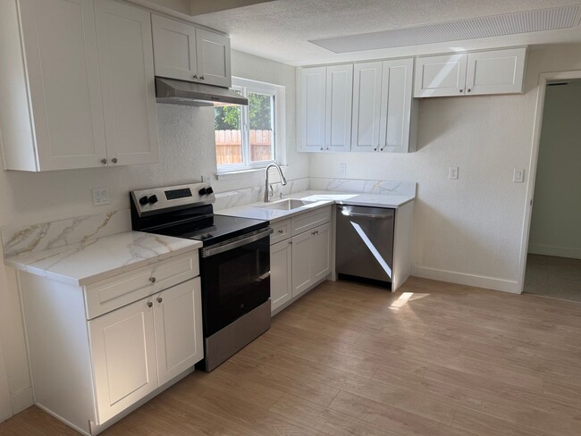 Building Photo - 7334-7336 Gigi Place