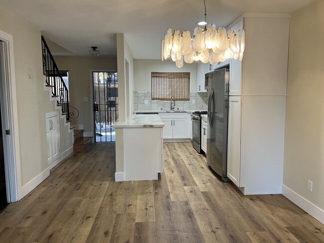 Kitchen and entryway - 1890 S Cochran Ave