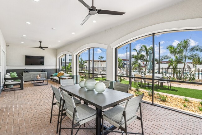 Covered Outdoor Patio Lounge - Revello Apartments