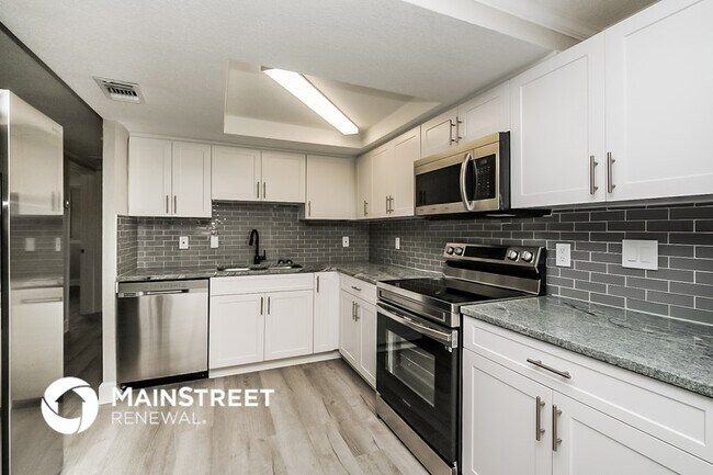 Foto del edificio - 12906 Kings Manor Ave