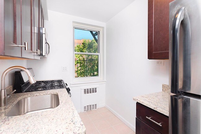 Building Photo - 5570 Netherland Ave