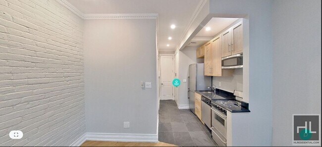 Foto del edificio - Renovated East Village 1-Bedroom with Brig...