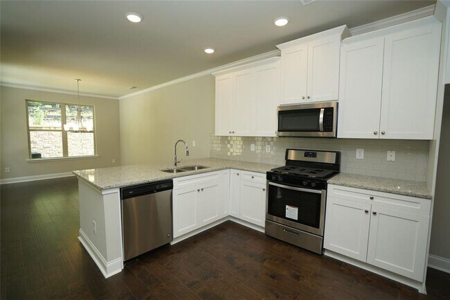 Foto del edificio - 5975 Arbor Knoll Pl