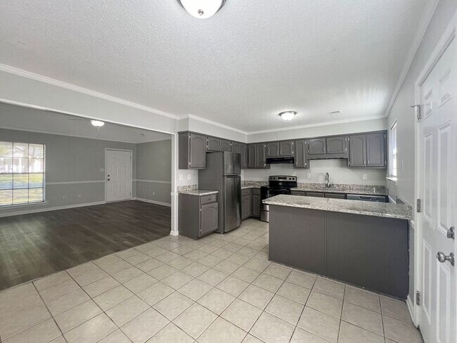 Building Photo - 10005 Riggan Dr