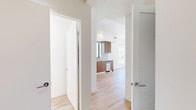 This contemporary 1-bedroom apartment in Los Angeles offers an efficient 480 square feet of living space, maximizing functionality without compromising on style. The open-concept design seamlessly integrates the kitchen, living, and dining areas, creating a spacious feel enhanced by large windows that flood the space with natural light and offer picturesque city views.

The kitchen is a highlight, featuring sleek wood cabinetry, quartz countertops, and stainless steel appliances, including a refrigerator, dishwasher, and built-in microwave. The living area, with its light wood flooring, provides ample space for relaxation and entertainment.

The bedroom, measuring 110 square feet, includes a mirrored closet for storage and continues the apartment's bright, airy aesthetic. The bathroom showcases modern fixtures, including a backlit mirror and a stylish vanity, complemented by a combination shower/tub.

Additional amenities include in-unit laundry facilities and recessed lighting throughout. Located at 10425–10431 Santa Monica Blvd, this apartment offers urban living in a prime Los Angeles location, blending comfort, style, and convenience in a compact yet well-designed space.