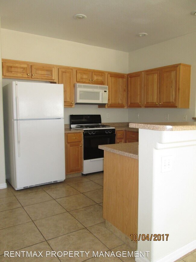 Building Photo - 3 br, 2 bath House - 9107 BUSHY TAIL AVE #102