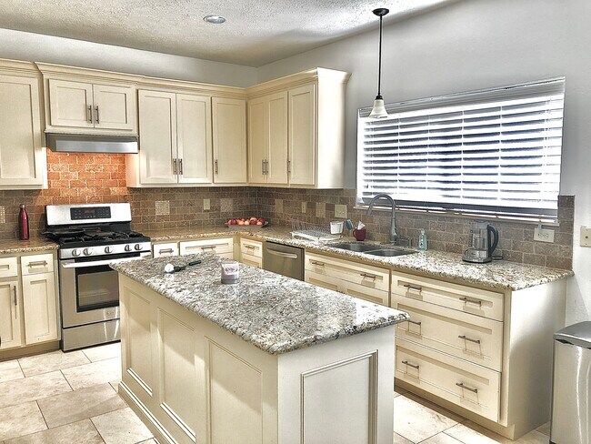 Kitchen has tons of counter space. - 10706 Allens Landing Dr