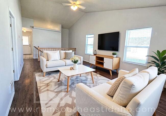 Building Photo - Spacious & Updated 2 Bedroom, 2 Bathroom Twin Home in Ammon with Garage, Fenced Backyard, and Hoo...