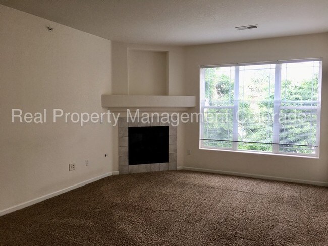 Building Photo - 8497 S HOYT WAY 202