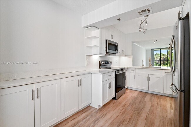 Building Photo - 6420 Boca Del Mar Dr