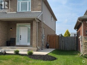 Building Photo - 8383 Heikoop Crescent
