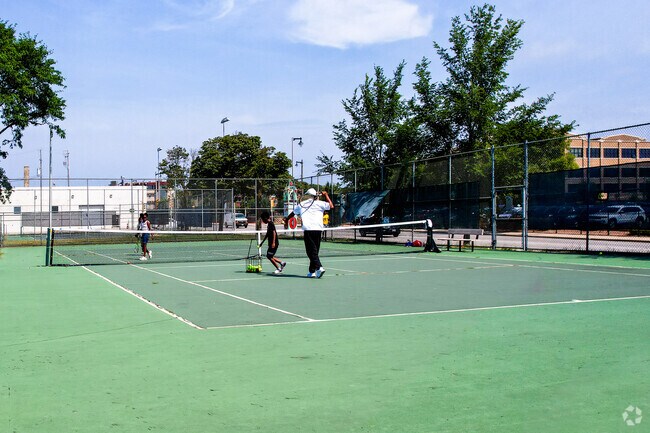 Tennis lessons are available at Merrill Park's tennis courts.