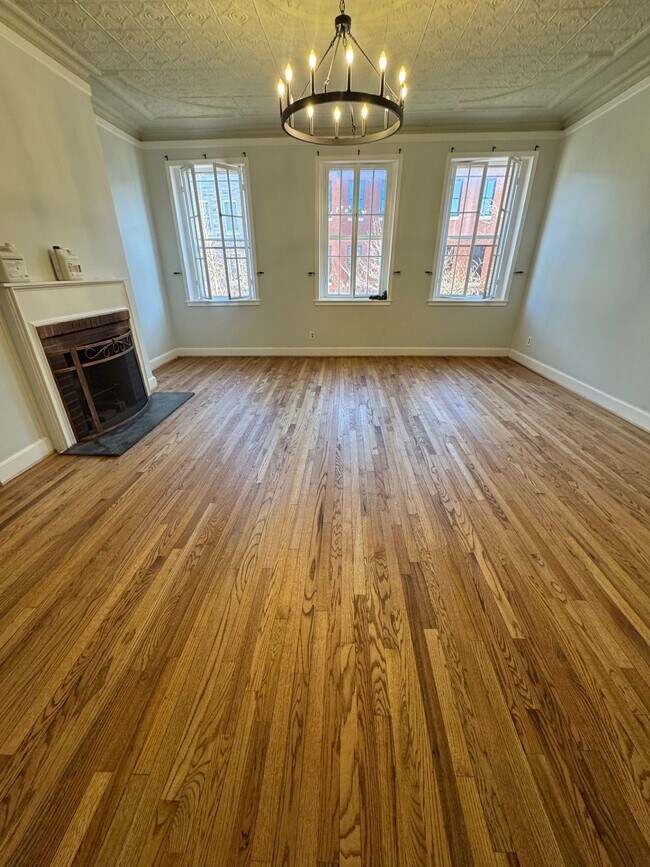 Great room - Floor just refinished! - 918 N. Calvert Street