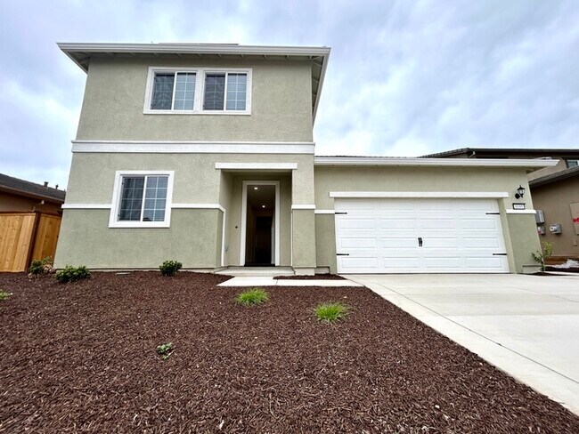 Building Photo - Beautiful New Solar 4 Bedroom Located in R...