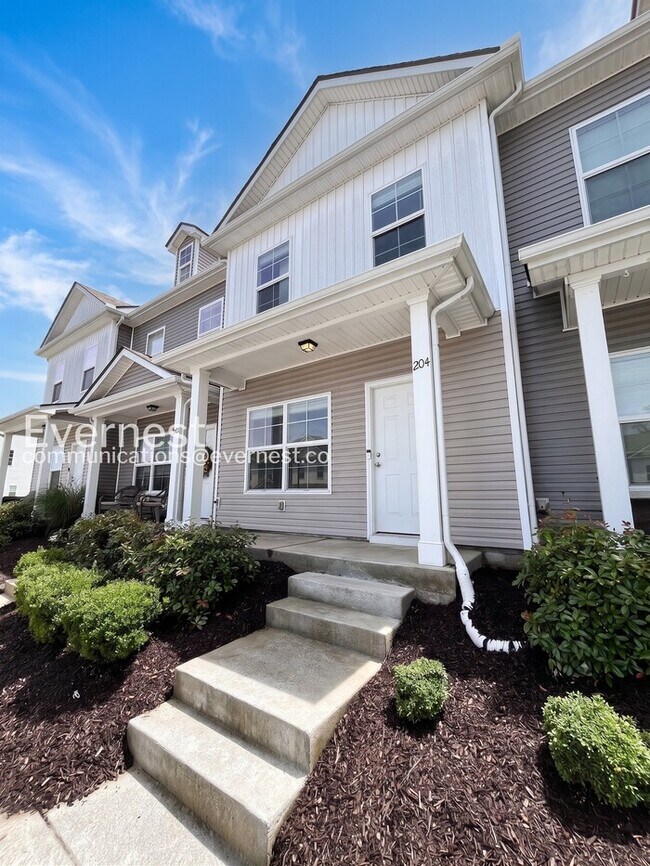 Building Photo - 2-Bed/3-Bath Townhouse with Modern Amenities/ Pet-Friendly /Available Now!