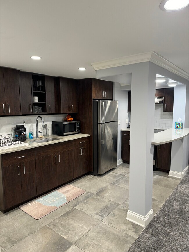 Custom kitchen with plenty of counter space - 6511 Oliver Ave S