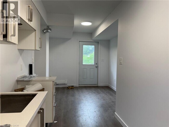 Photo du bâtiment - 107 HighRiver Trl