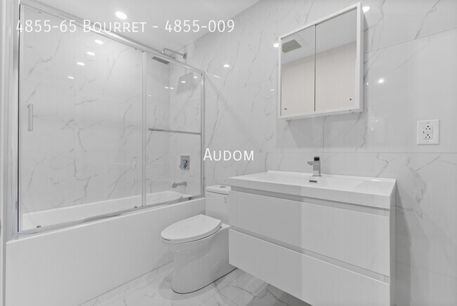 Building Photo - 4855-65 Av Bourret