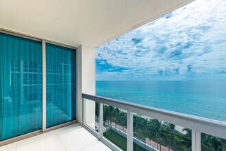 Building Photo - 6899 Collins Ave