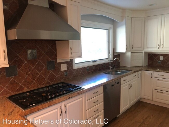 Foto del edificio - 4 br, 4 bath House - 5552 S. Kittredge St.