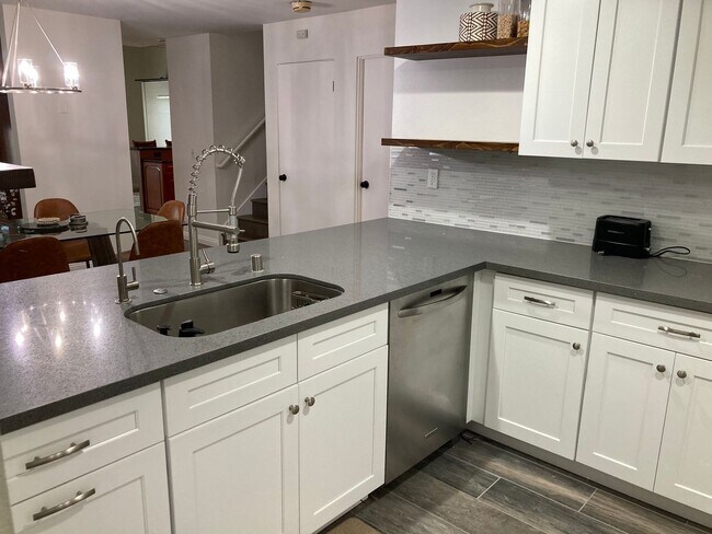 Building Photo - Beachside Furnished Retreat! Remodeled 2BD/2BA Condo Steps from the Sand!