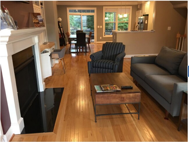 bath on all floors, fireplace, upgraded wood floors everywhere - 1725 Belvedere Plz