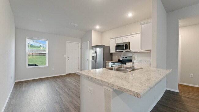 Foto del edificio - "Charming 4-Bedroom Home with Granite Touc...
