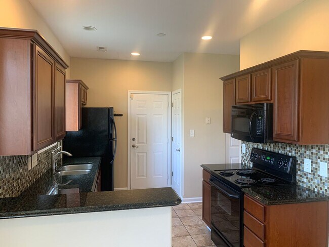 Building Photo - Pristine, Move in Ready home located in th...