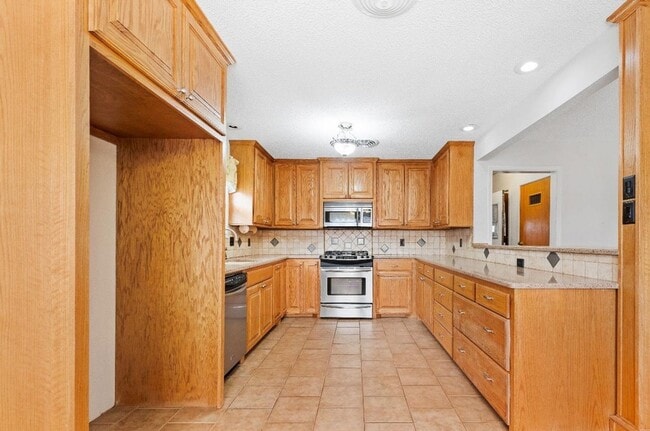 Building Photo - As About Our Move-In Special! Spacious 3 B...
