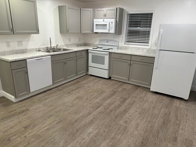Brand new appliances in this large eat in kitchen. - 6045 Library Rd