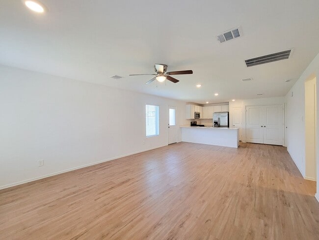 Building Photo - This single-story home has a comfortable layout with three bedrooms and a living area all on one ...