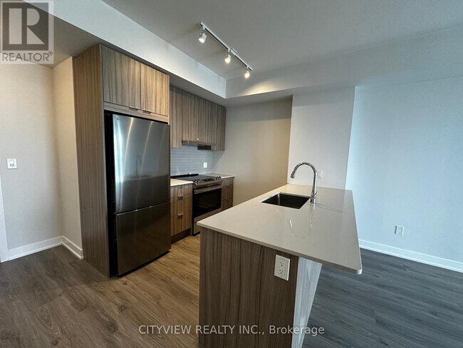 Building Photo - 430-2430 Square One Dr