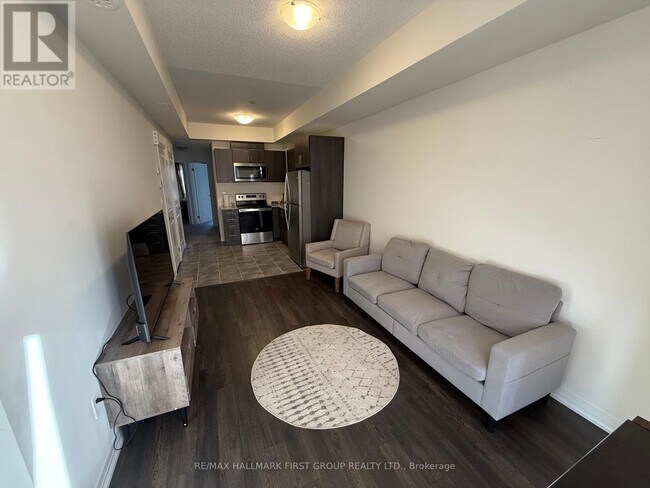 Photo du bâtiment - 235-235 McLevin Ave