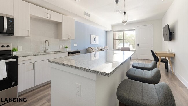 Building Photo - 6525 Ed Bluestein Blvd