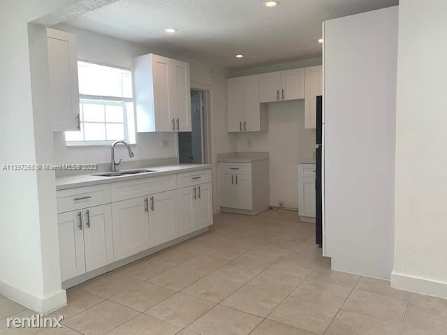 Foto del edificio - 3 br, 2 bath House - 4930 NW 13th St # 0