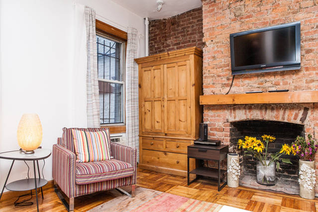 living room/fireplace detail/parquee floors - 270 E 7th St