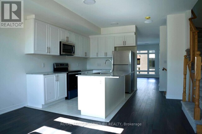 Photo du bâtiment - 75 Sidney Rose Cmn