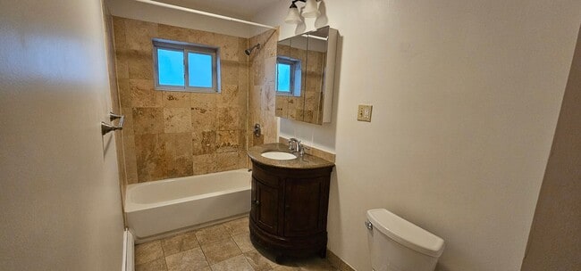 Building Photo - Spacious, Bright 2-Bed with Heat and Hot W...
