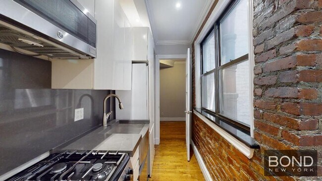 Foto del edificio - 410 E 13th St