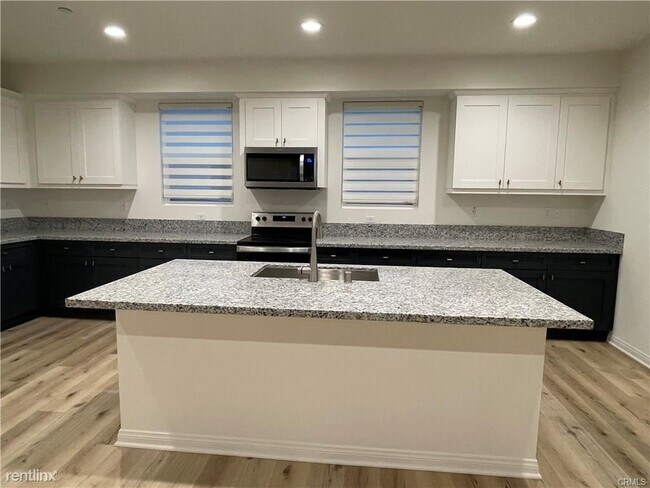 Foto del edificio - 4 br, 3.5 bath House - 200 N Standard Ave