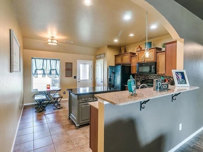 Building Photo - AVAILABLE NOW -  $500 Off First Month | 4-Bed Home in the Heart of Mustang | Storm Shelter & Mode...