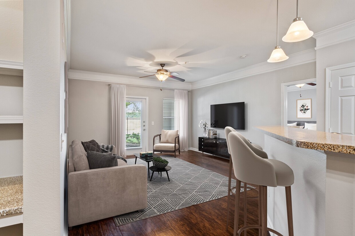 Living Room with Private Patio - Carrington Place Apartments