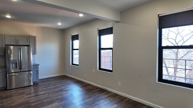 Building Photo - Fresh, Two-Story OTR Duplex with Downtown Views – Renovated 3BR/2BA, In-Unit Laundry