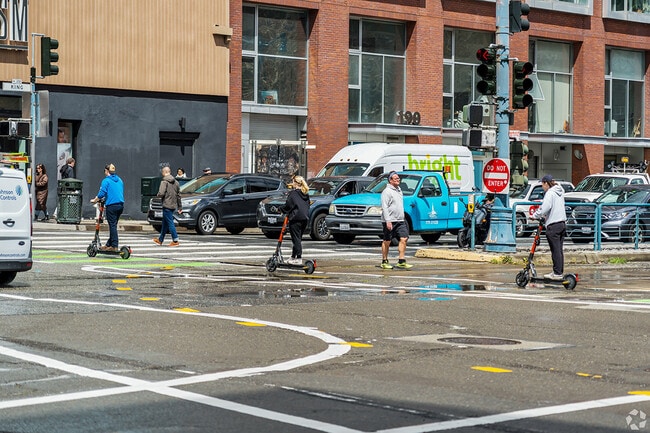 Cars, walking, and scooters are common.